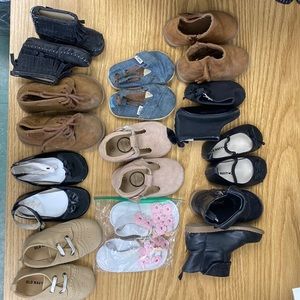 Baby girl collection of shoes ranging from size 4. - 5